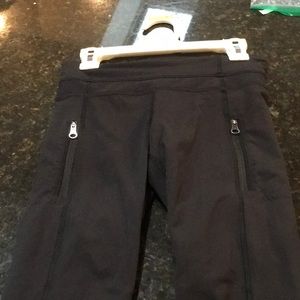 Lululemon, size 00, black with Mesh see-through areas on the leg